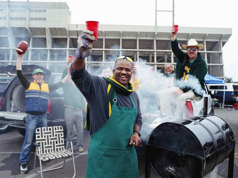 https://www.gettyimages.co.uk/detail/photo/men-having-barbeque-at-tailgate-party-in-stadium-royalty-free-image/200118084-003?phrase=BBQ+cap&adppopup=true