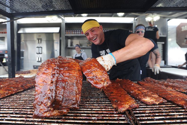 https://www.gettyimages.com/detail/news-photo/barbeque-masters-basting-their-meats-with-plenty-of-sauce-news-photo/172235150