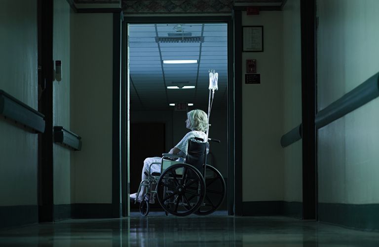 https://www.gettyimages.co.uk/detail/photo/female-patient-in-wheelchair-with-intravenous-drip-royalty-free-image/114857420?phrase=Woman+in+hospital+gown&adppopup=true