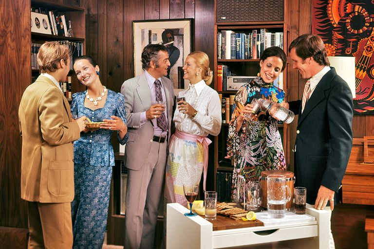 https://www.gettyimages.com/detail/news-photo/1970s-cocktail-party-3-couples-men-women-standing-in-living-news-photo/1062097548