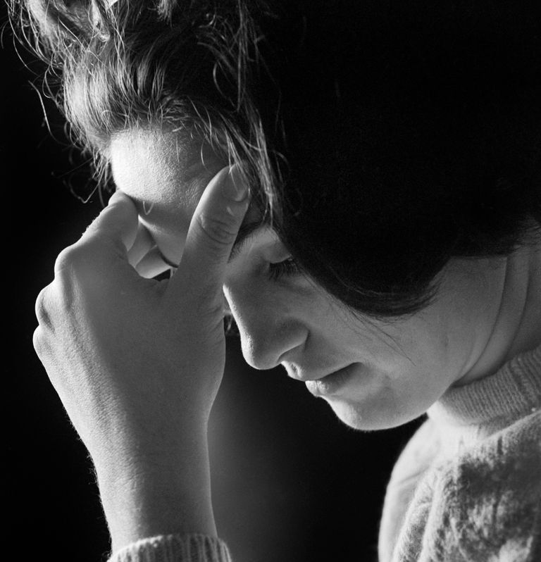 https://www.gettyimages.com/detail/news-photo/1960s-1970s-woman-holding-her-forehead-in-her-hand-headache-news-photo/523458948