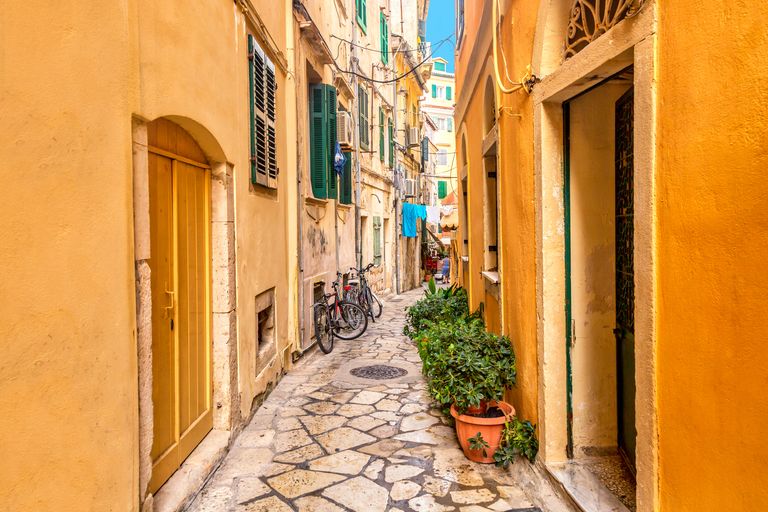 https://www.gettyimages.co.uk/detail/photo/kerkyra-city-narrow-street-view-with-yellow-royalty-free-image/1343637983