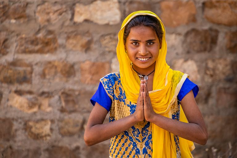 https://www.gettyimages.com/detail/photo/namaste-portrait-of-happy-indian-girl-in-desert-royalty-free-image/1475221582?phrase=Namaste