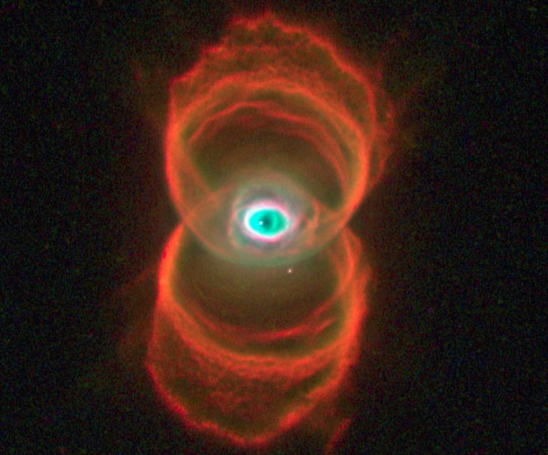 https://www.gettyimages.co.uk/detail/news-photo/planetary-nebula-with-an-hourglass-shape-mycn18-shows-round-news-photo/615306450?adppopup=true