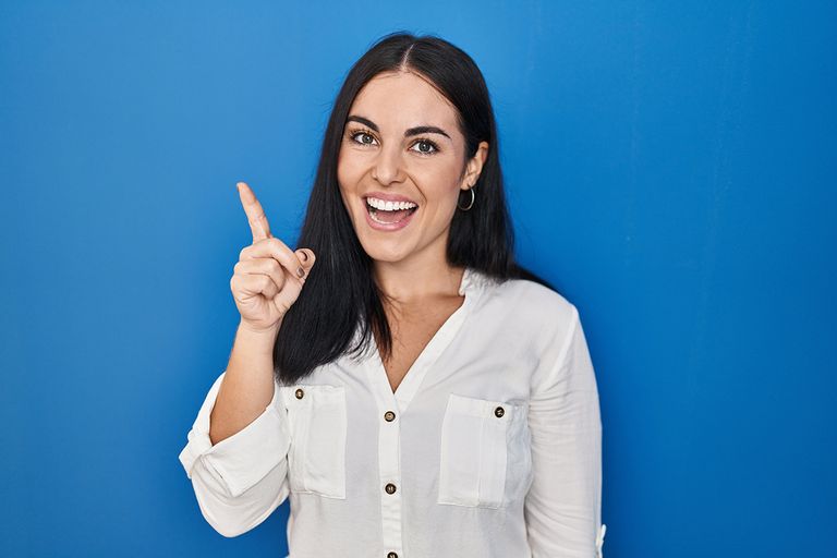 https://www.gettyimages.com/detail/photo/young-hispanic-woman-standing-over-blue-background-royalty-free-image/1404469281?phrase=Spanish+numerical+