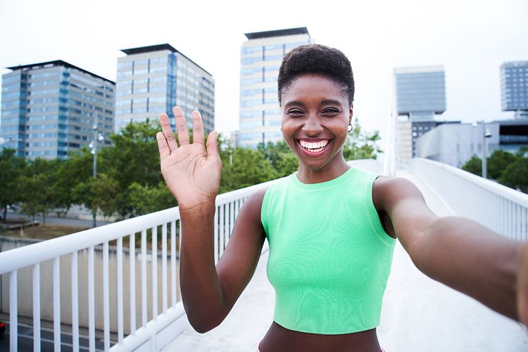 https://www.gettyimages.com/detail/photo/portrait-of-a-happy-black-woman-no-a-video-call-royalty-free-image/1410672312?phrase=say+greetings+vintage