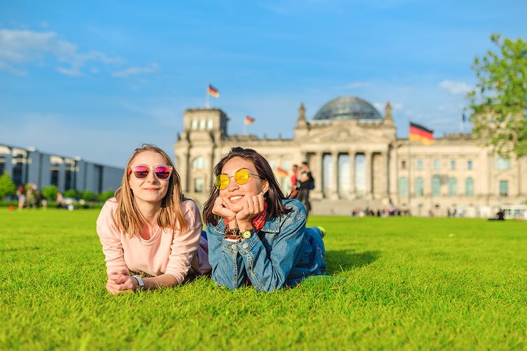 https://www.gettyimages.com/detail/photo/two-young-happy-girls-wearing-sun-glasses-lying-on-royalty-free-image/1145669253?phrase=germany