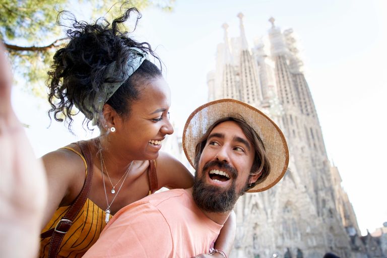 https://www.gettyimages.com/detail/photo/happily-just-married-couple-taking-a-selfie-with-royalty-free-image/1400420488?phrase=spain