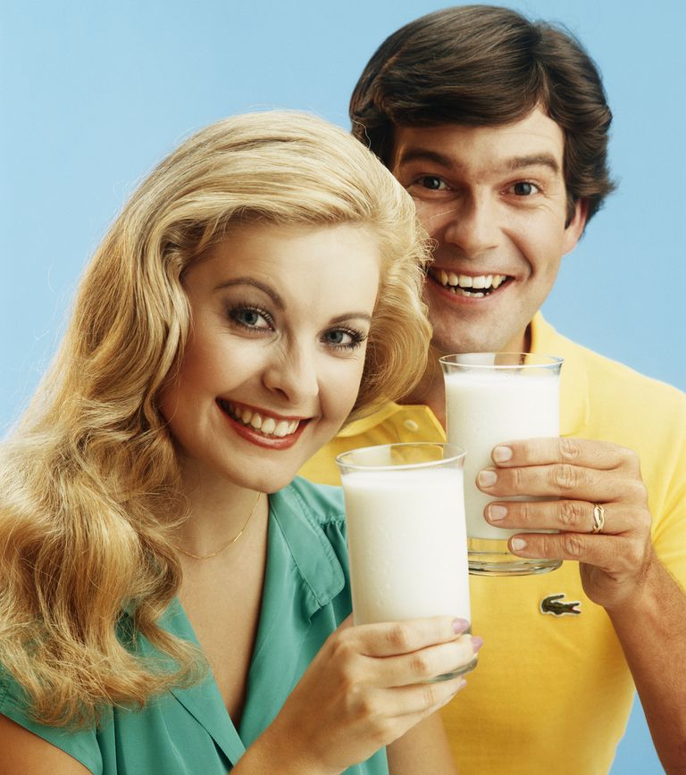 https://www.gettyimages.co.uk/detail/news-photo/young-couple-holding-glasses-of-milk-smiling-portrait-news-photo/119684160?adppopup=true