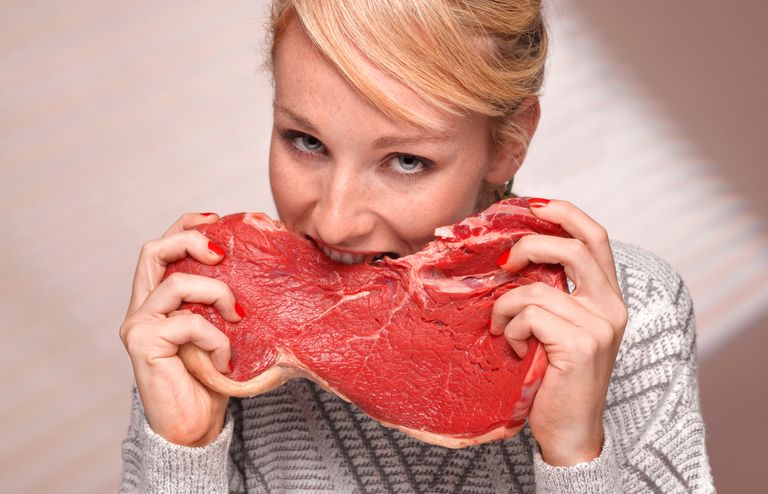 https://www.gettyimages.com/detail/photo/woman-eating-steak-royalty-free-image/518884925?phrase=eating+raw+meat&adppopup=true