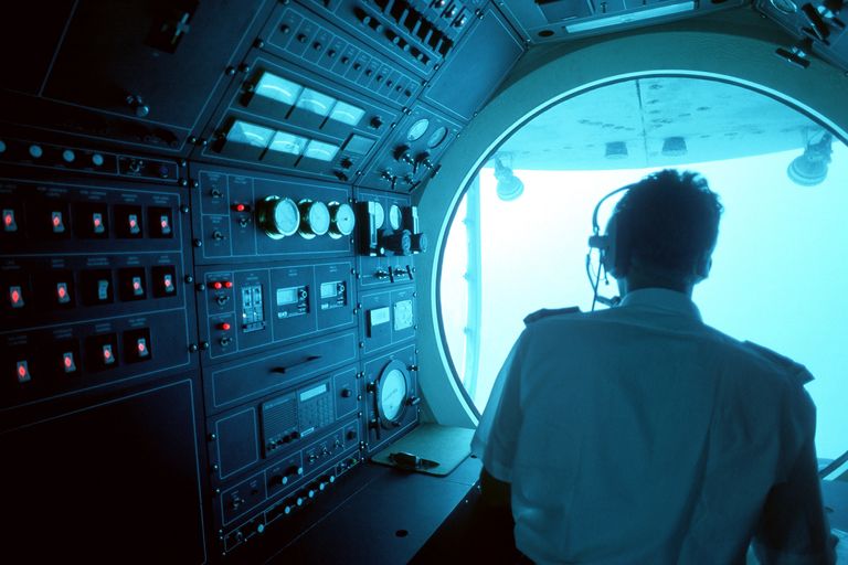 https://www.gettyimages.com/detail/photo/man-navigating-submarine-royalty-free-image/78252849?phrase=submarine&adppopup=true