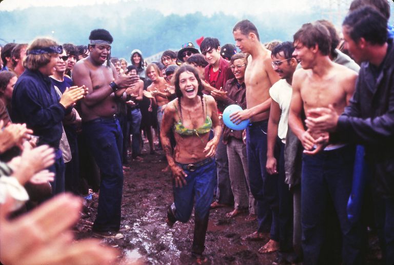 https://www.gettyimages.co.uk/detail/news-photo/woman-running-through-the-mud-at-the-woodstock-music-news-photo/1161372043