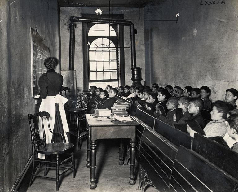 https://www.gettyimages.co.uk/detail/news-photo/view-of-a-lower-east-side-schoolroom-a-teacher-demonstrates-news-photo/515412336