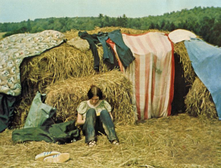 https://www.gettyimages.co.uk/detail/news-photo/attendee-leans-against-hay-bale-at-the-woodstock-music-news-photo/1166254383