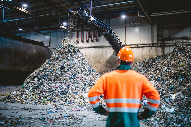 https://www.gettyimages.co.uk/detail/photo/worker-observing-processing-of-waste-at-recycling-royalty-free-image/1253813515