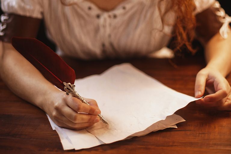 https://www.gettyimages.com/detail/photo/young-woman-with-with-long-wavy-red-hair-wearing-royalty-free-image/1210849104?phrase=woman+prisoner+writing+vintage
