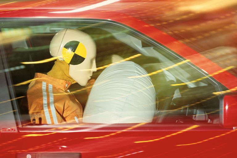 https://www.gettyimages.co.uk/detail/photo/air-safety-bag-demo-in-car-with-dummies-royalty-free-image/10005514