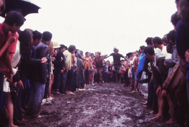 https://www.gettyimages.co.uk/detail/news-photo/people-running-to-jump-into-the-mud-at-the-woodstock-music-news-photo/1250487338