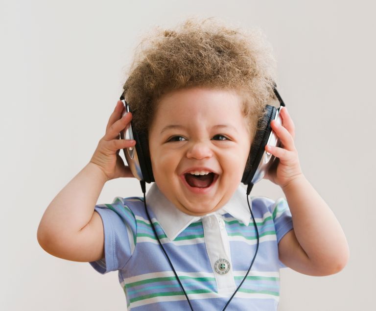 https://www.gettyimages.co.uk/detail/photo/mixed-race-baby-listening-to-headphones-royalty-free-image/82149796