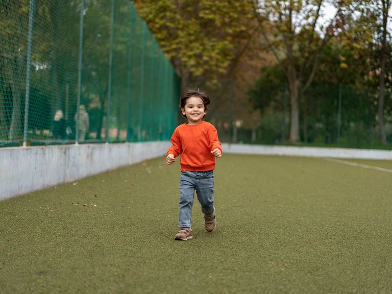 https://www.gettyimages.co.uk/detail/photo/little-boy-running-on-sports-court-royalty-free-image/1466947938
