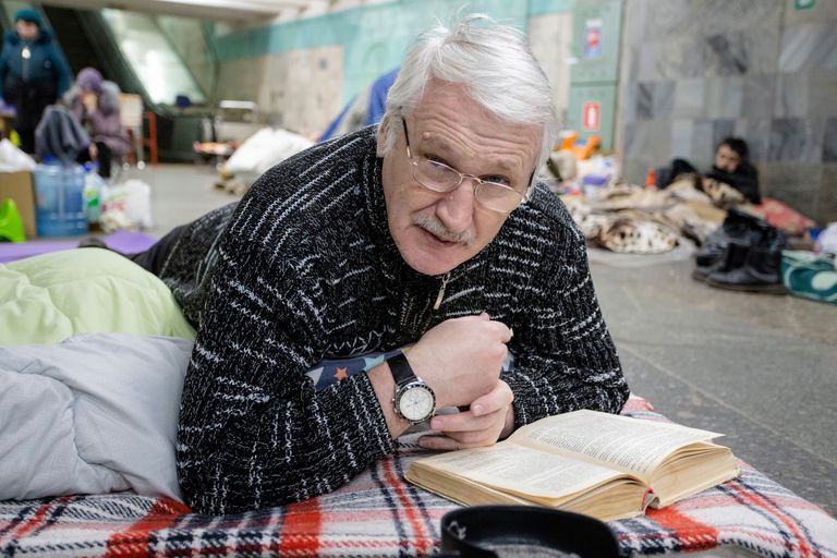 https://www.gettyimages.co.uk/detail/news-photo/man-reads-a-book-using-the-subway-as-a-bomb-shelter-on-news-photo/1422171789