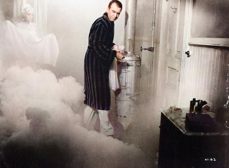 https://www.gettyimages.co.uk/detail/news-photo/gary-cooper-standing-in-his-bathrobe-with-a-ghost-figure-news-photo/159822018