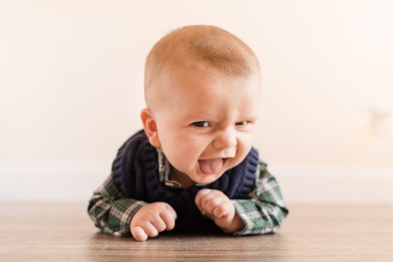 https://www.gettyimages.co.uk/detail/photo/week-old-happy-baby-boy-dressed-in-a-green-plaid-royalty-free-image/1392798394
