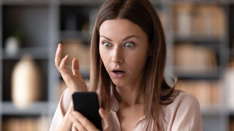 https://www.gettyimages.co.uk/detail/photo/close-up-young-shocked-woman-looking-at-mobile-royalty-free-image/1217463785?phrase=The+Prank+Call