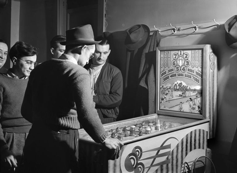 https://www.gettyimages.co.uk/detail/news-photo/group-of-men-playing-pinball-machine-at-steelworkers-news-photo/1371375511