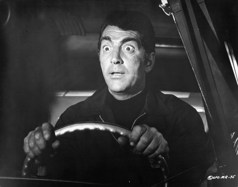 https://www.gettyimages.co.uk/detail/news-photo/dean-martin-behind-the-wheel-of-a-car-with-shocked-look-on-news-photo/140655415