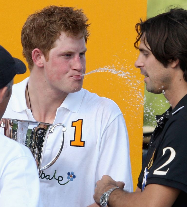 https://www.gettyimages.co.uk/detail/news-photo/prince-harry-spits-champagne-at-nacho-figueras-captain-of-news-photo/88074253