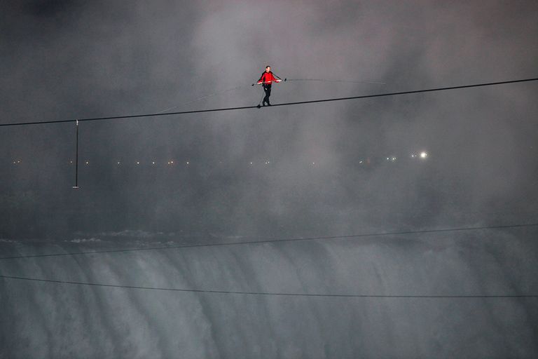 https://www.gettyimages.com/detail/news-photo/nik-wallenda-makes-his-historic-walk-on-a-wire-across-news-photo/566005789