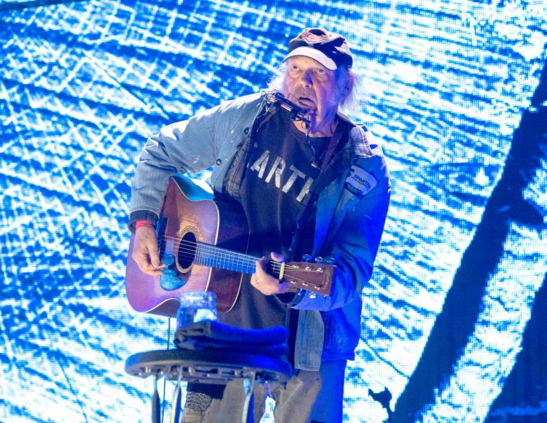 https://www.gettyimages.com/detail/news-photo/neil-young-performs-in-concert-during-farm-aid-at-ruoff-news-photo/1699335534