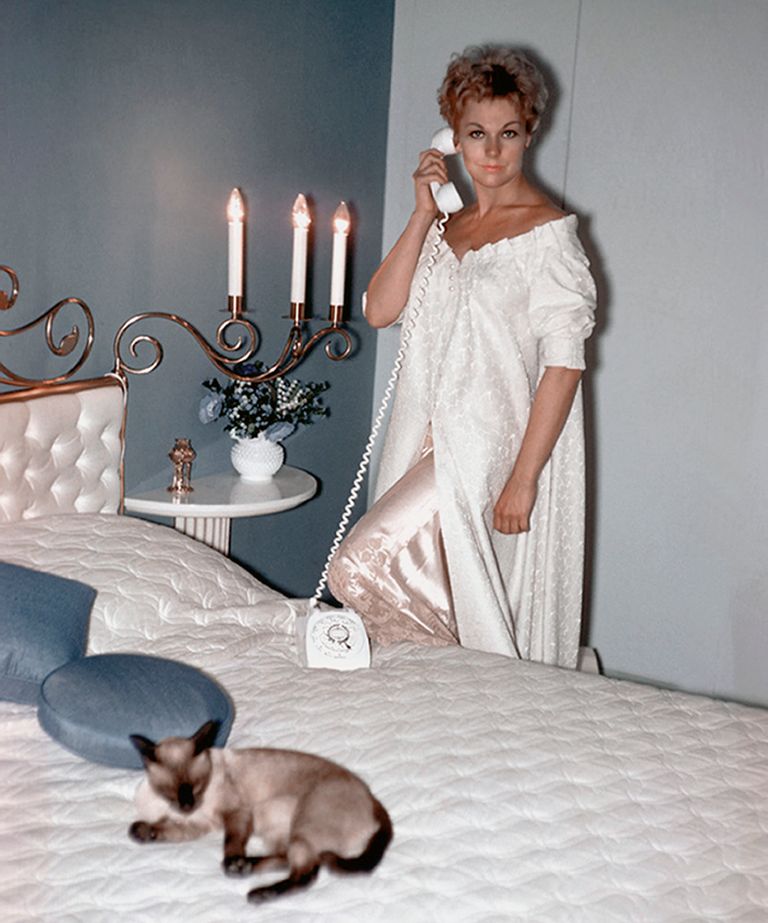 https://www.gettyimages.com/detail/news-photo/kim-novak-portrait-session-at-home-in-her-bedroom-with-her-news-photo/1141553317
