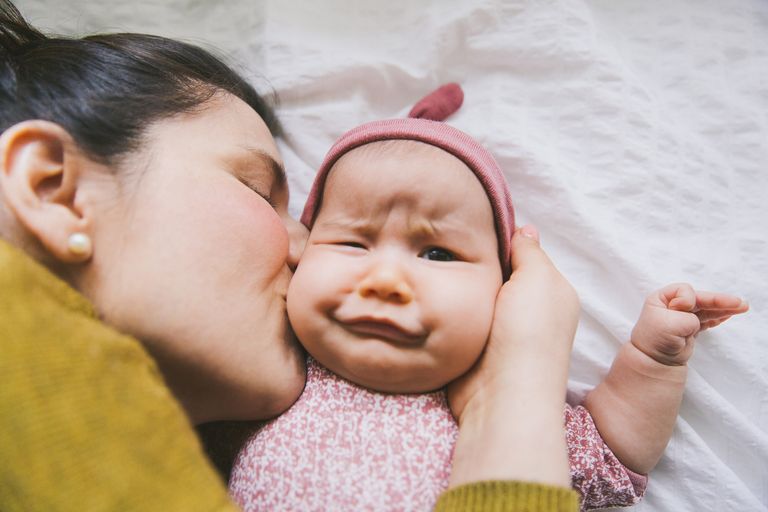 https://www.gettyimages.co.uk/detail/photo/baby-making-funny-face-when-mother-kiss-royalty-free-image/685039668