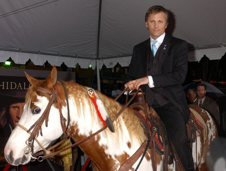 https://www.gettyimages.com/detail/news-photo/viggo-mortensen-atop-his-american-painted-horse-hidalgo-news-photo/83297792