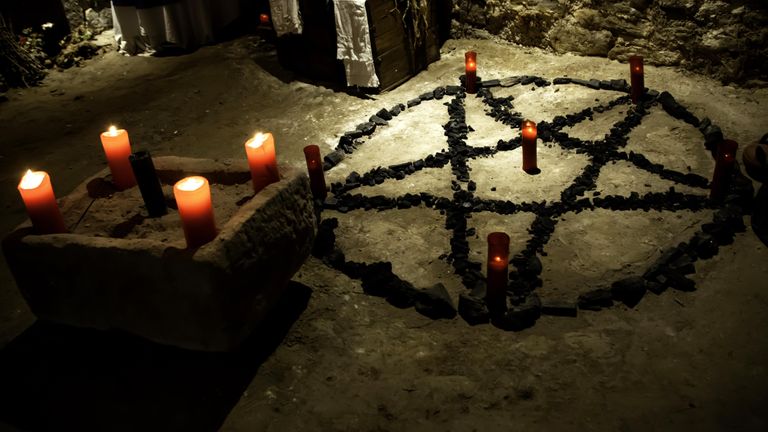 https://www.gettyimages.co.uk/detail/photo/altar-rituals-satanic-royalty-free-image/1163408439?phrase=pentagram+devil&adppopup=true