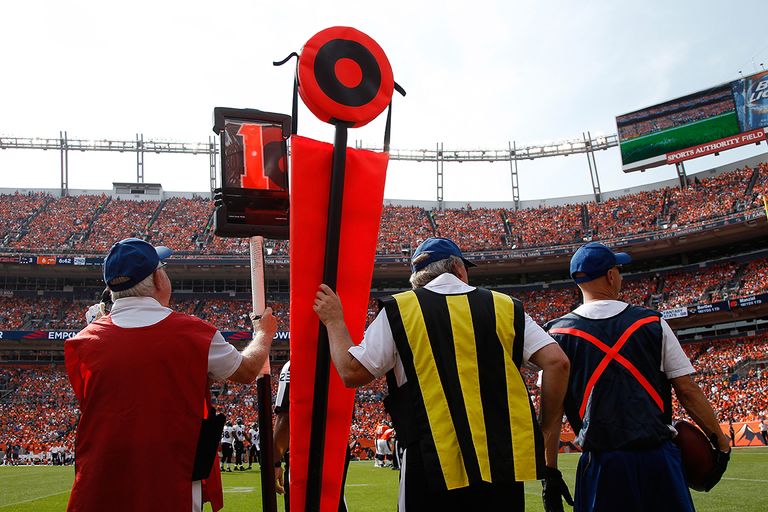 https://www.gettyimages.com/detail/news-photo/the-chain-gang-works-the-sticks-on-the-sidelines-along-with-news-photo/488322320