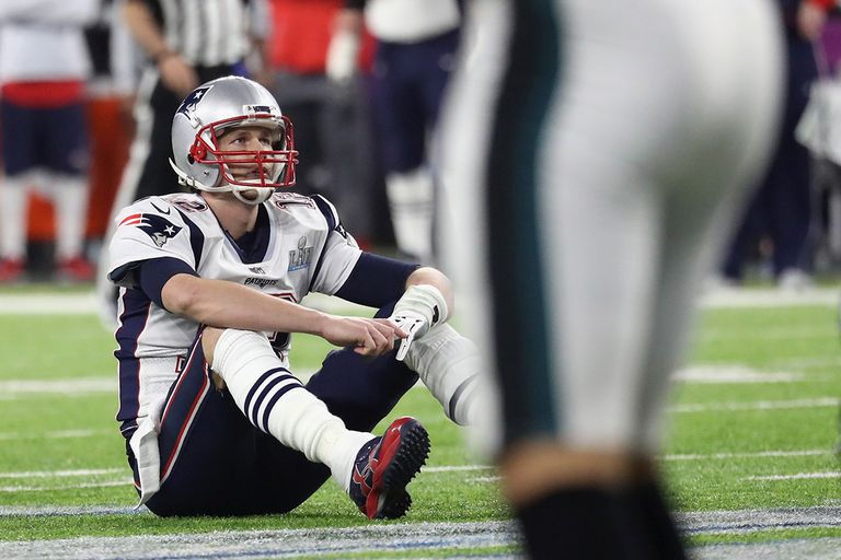 https://www.gettyimages.com/detail/news-photo/tom-brady-of-the-new-england-patriots-reacts-after-fumbling-news-photo/914347242?adppopup=true