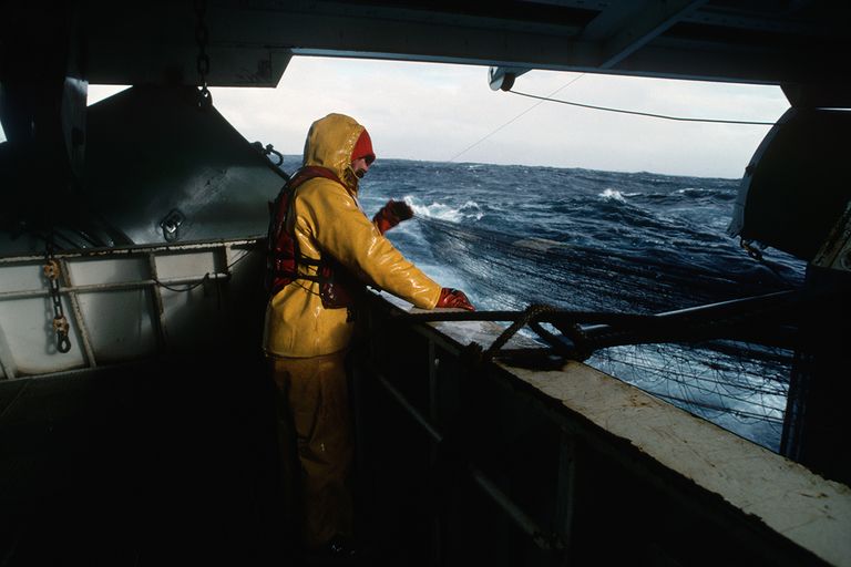 https://www.gettyimages.com/detail/photo/crewman-tending-to-nets-on-trawler-royalty-free-image/528710776?phrase=ship+crew+night+storm