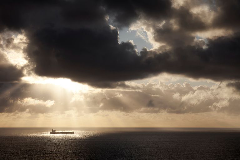 https://www.gettyimages.com/detail/photo/container-ship-after-a-storm-royalty-free-image/155146549?phrase=cargo+ship++storm