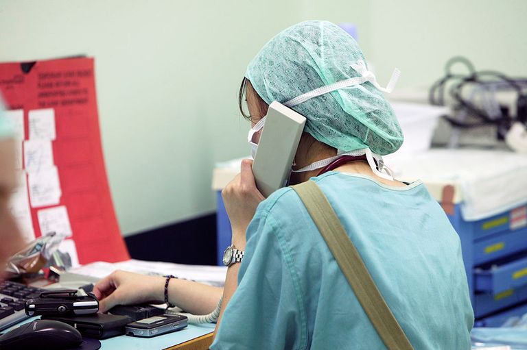https://www.gettyimages.co.uk/detail/news-photo/surgical-nurse-speaking-on-telephone-in-surgical-theatre-uk-news-photo/129378518?adppopup=true