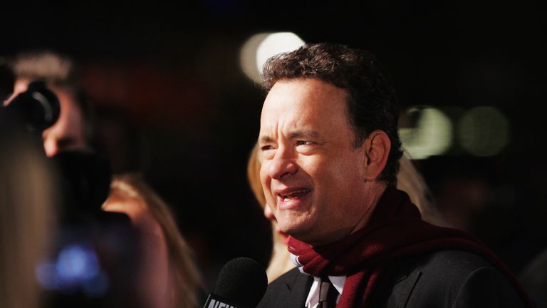 https://www.gettyimages.com/detail/news-photo/actor-tom-hanks-is-interviewed-as-he-arrives-at-the-news-photo/78849361