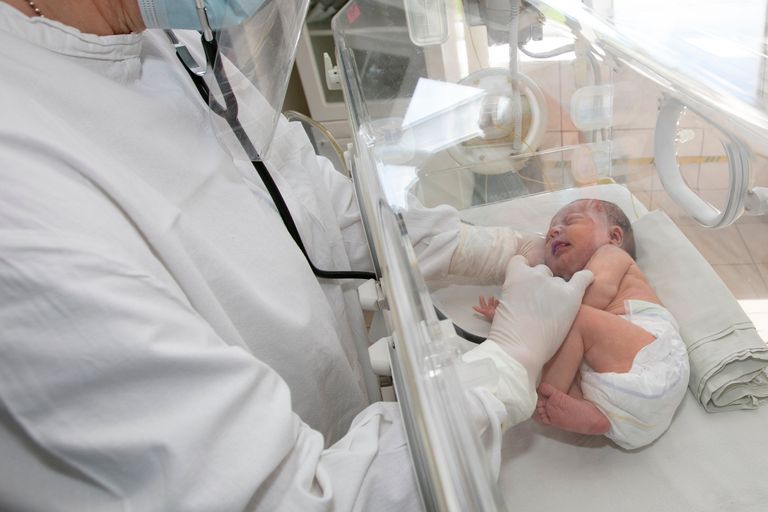 https://www.gettyimages.co.uk/detail/photo/doctor-watches-over-a-premature-baby-in-the-royalty-free-image/1431353443?phrase=newborn&adppopup=true
