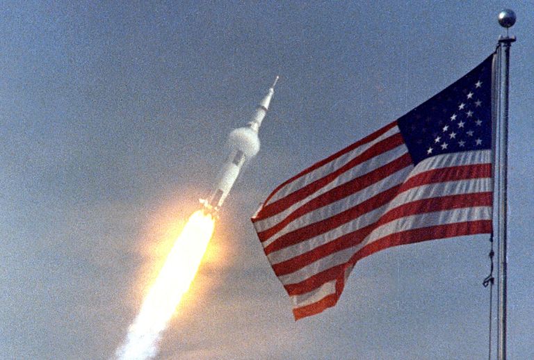 https://www.gettyimages.com/detail/news-photo/the-american-flag-heralds-the-flight-of-apollo-11-the-first-news-photo/1371400008