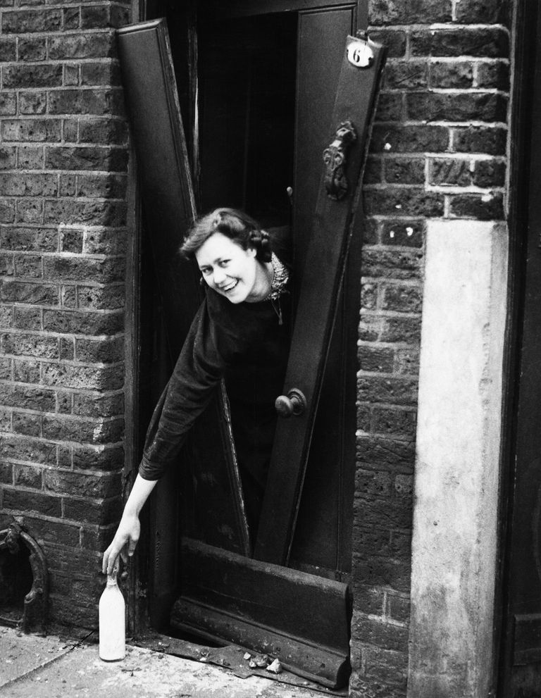 https://www.gettyimages.co.uk/detail/news-photo/housewife-reaching-for-milk-through-the-door-in-london-on-news-photo/107415948