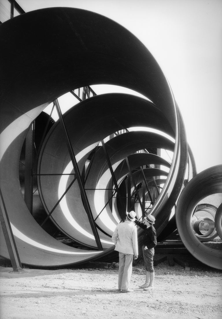https://www.gettyimages.co.uk/detail/news-photo/two-men-looking-at-huge-pipes-for-the-hoover-dam-news-photo/594892492