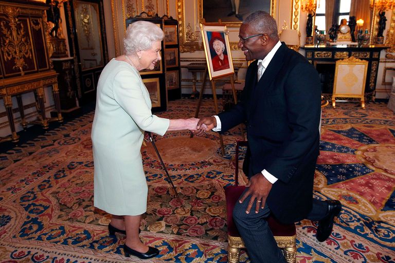 https://www.gettyimages.com/detail/news-photo/queen-elizabeth-ii-shakes-hands-after-knighting-sir-rodney-news-photo/459986182