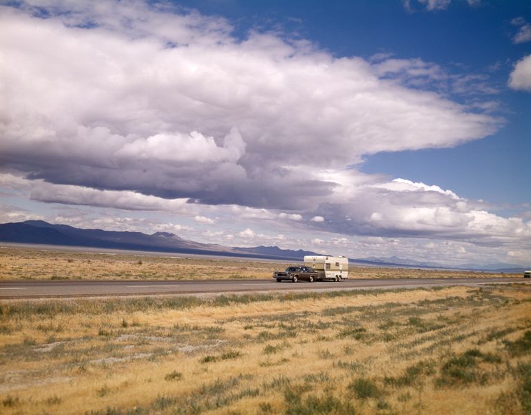 https://www.gettyimages.co.uk/detail/news-photo/1970s-station-wagon-pulling-rv-camper-interstate-80-near-news-photo/707707365