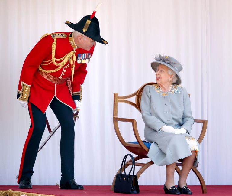 https://www.gettyimages.co.uk/detail/news-photo/queen-elizabeth-ii-talks-with-lieutenant-colonel-michael-news-photo/1324680596?adppopup=true